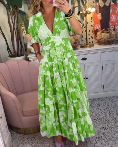 Daniela | Vestido con bolsillos, escote en V y estampado floral.