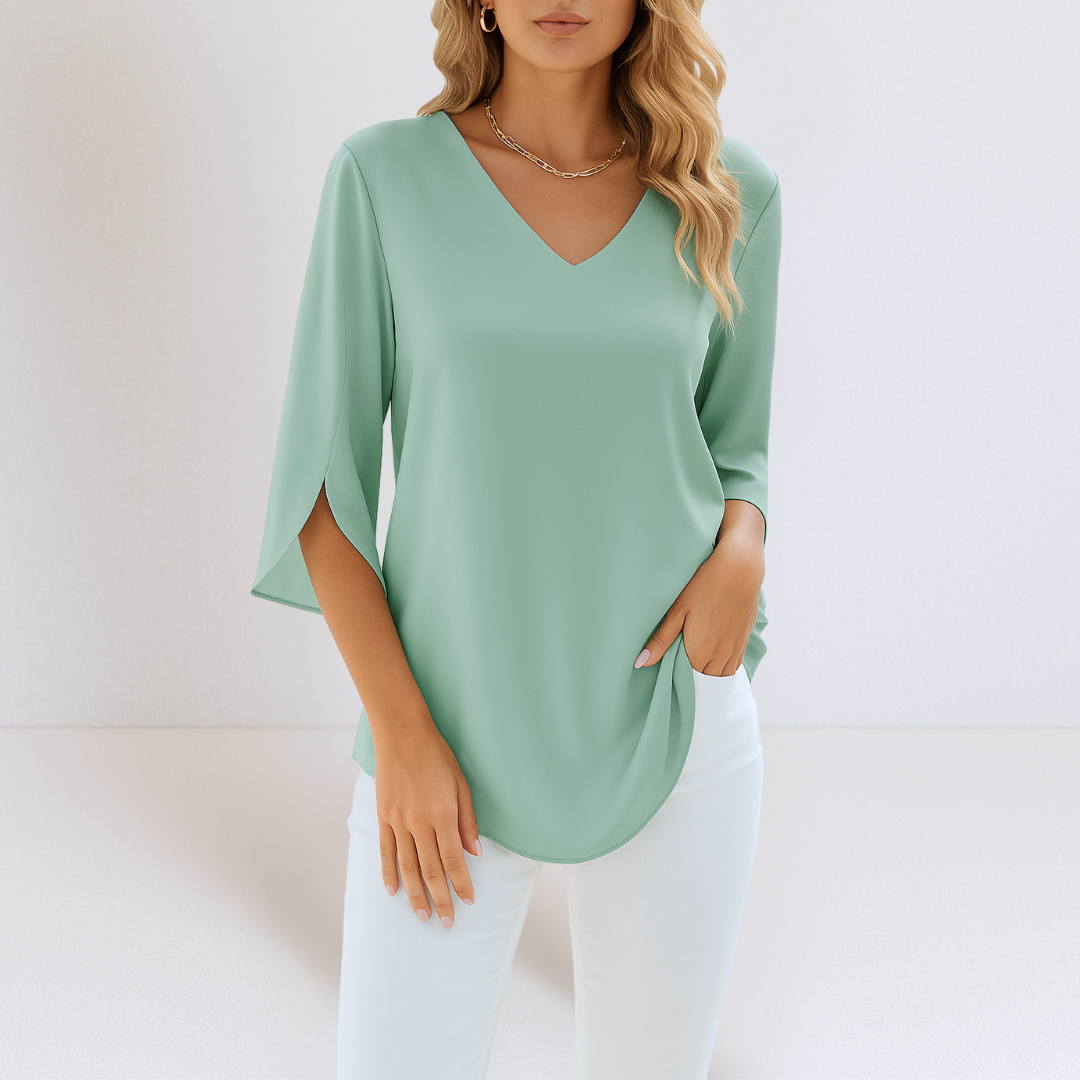 Sophie | Blusa elegante con escote en V y mangas abiertas.