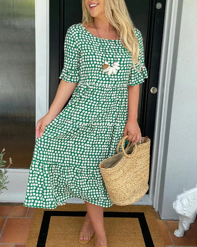 Jessika | Vestido midi elegante con divertidos detalles de volantes