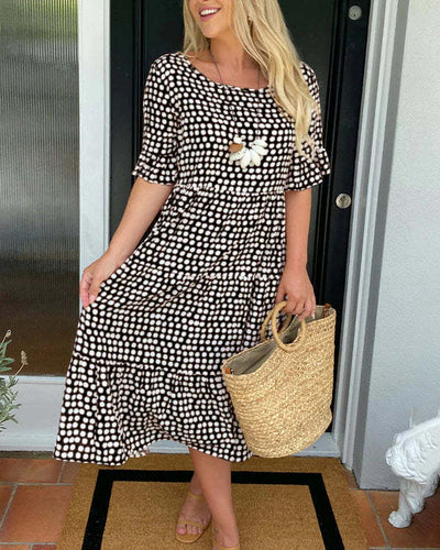 Jessika | Vestido midi elegante con divertidos detalles de volantes